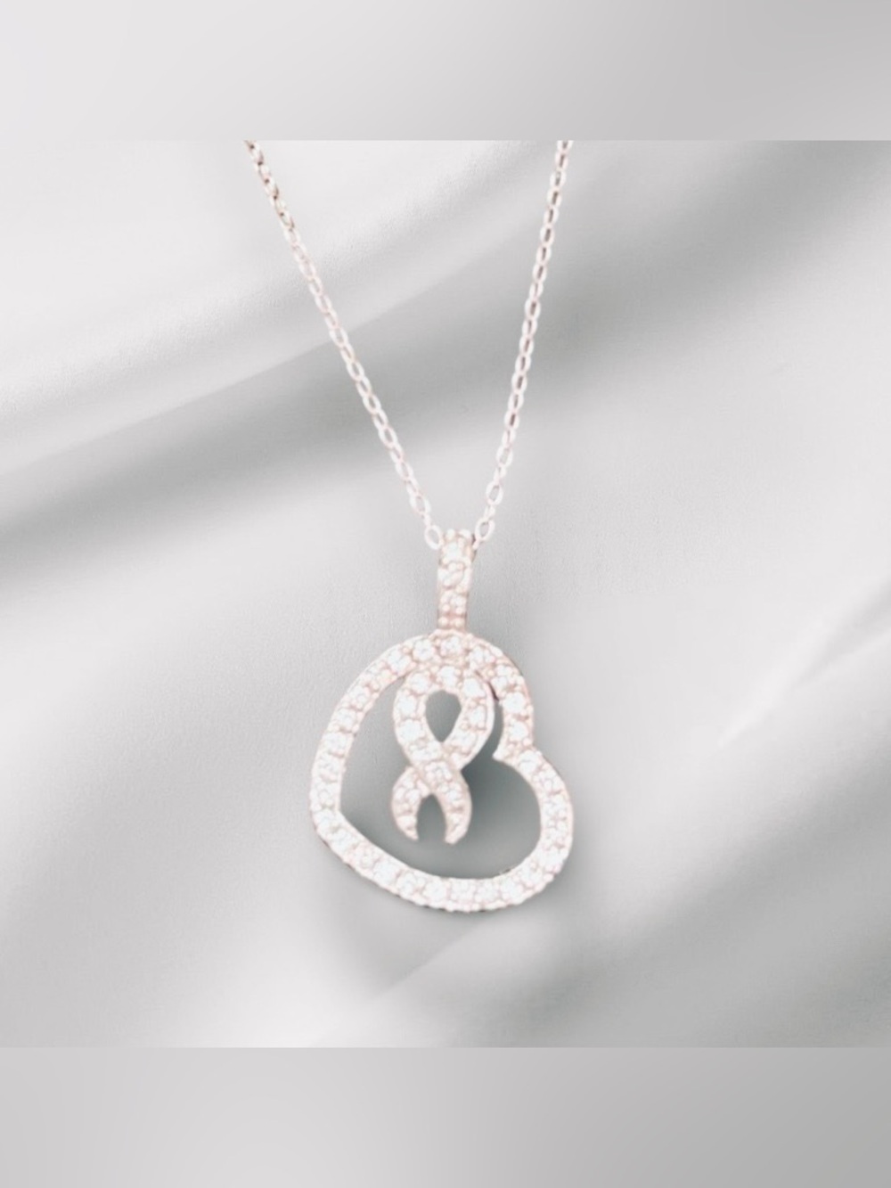 Sparkling Heart Ribbon Pendant Necklace in Sterling Silver